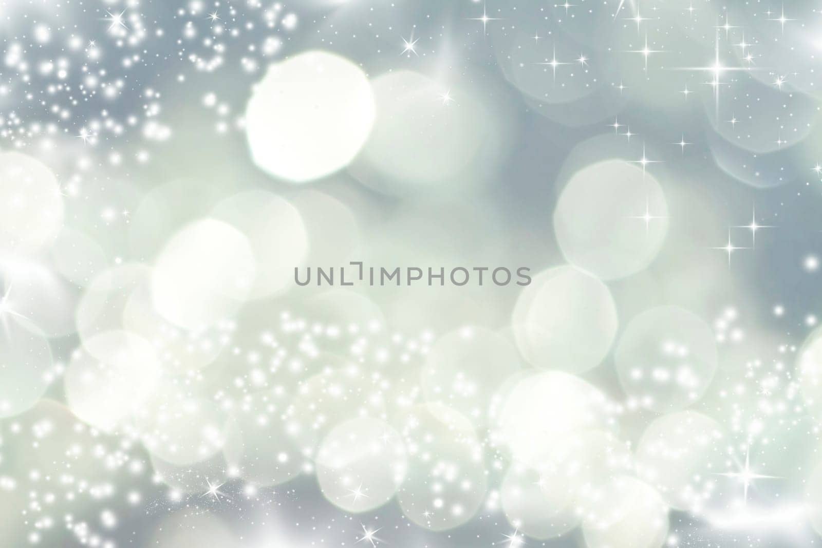 Abstract Christmas background of holiday lights, stars, and snowflakes