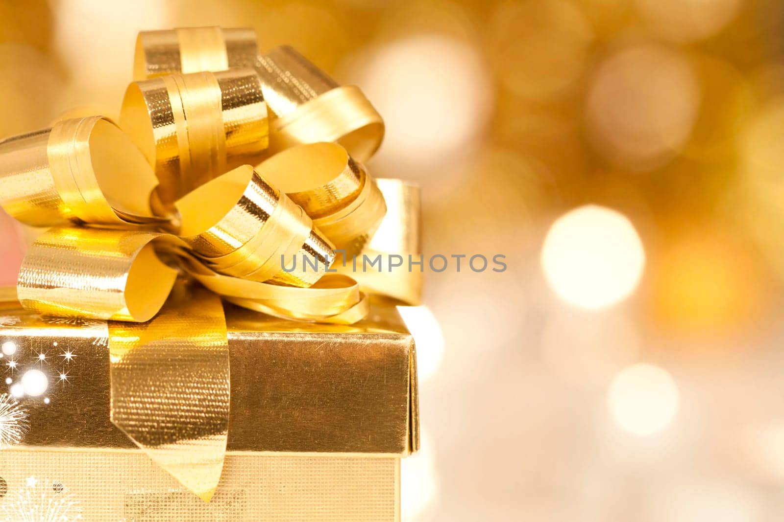 Gift box and candles and holiday lights