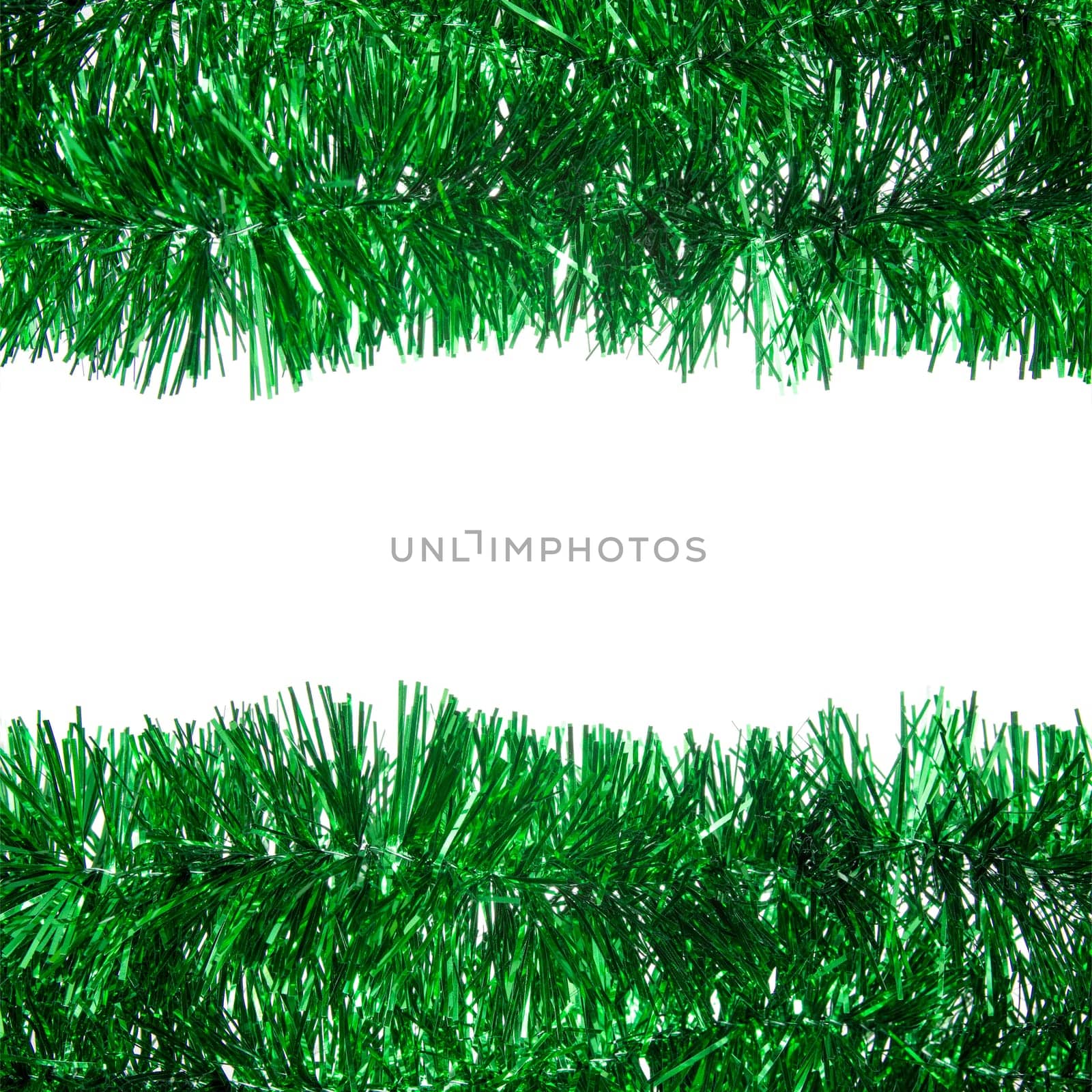 Green Christmas tinsel garland with center copy space
