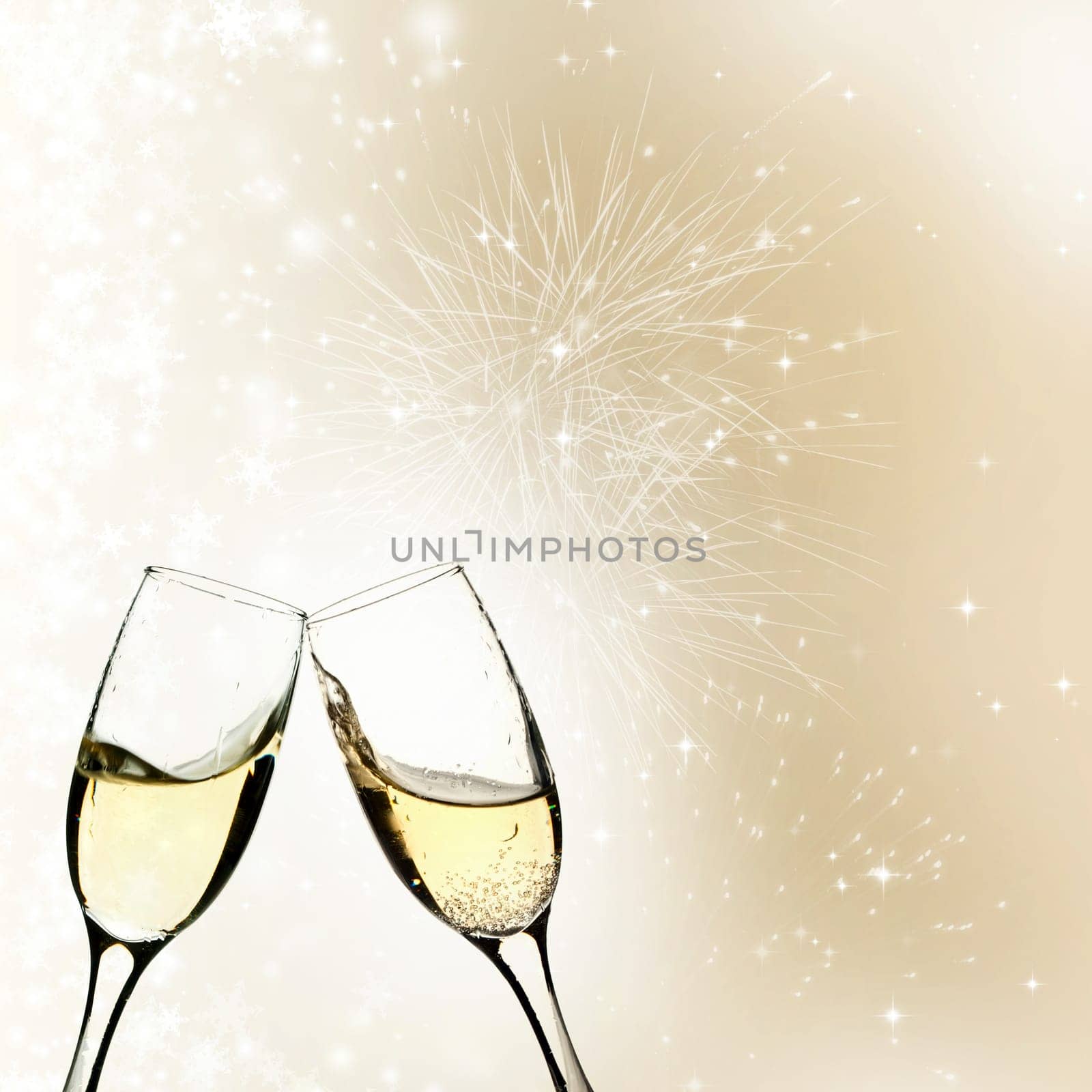 Glasses of champagne against holiday background