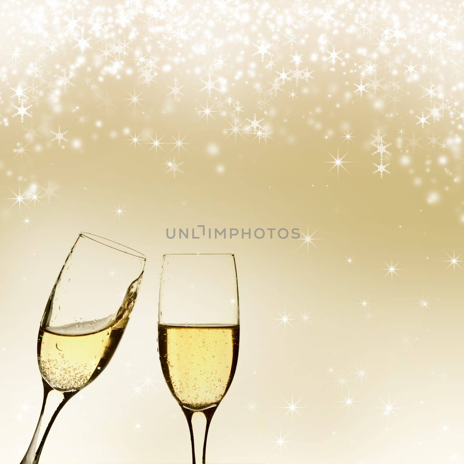 Glasses of champagne against holiday background