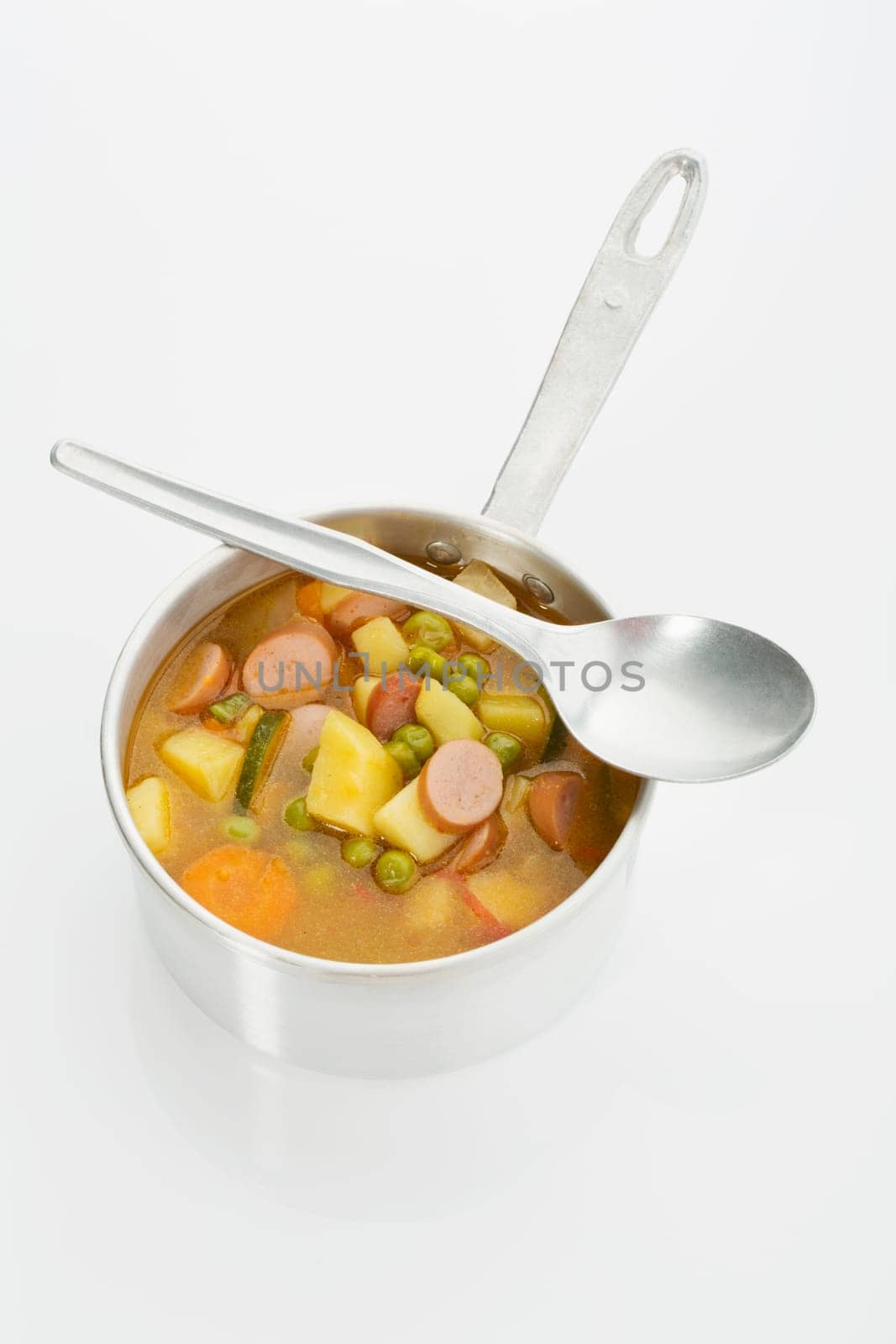 Vegetable soup with sausages