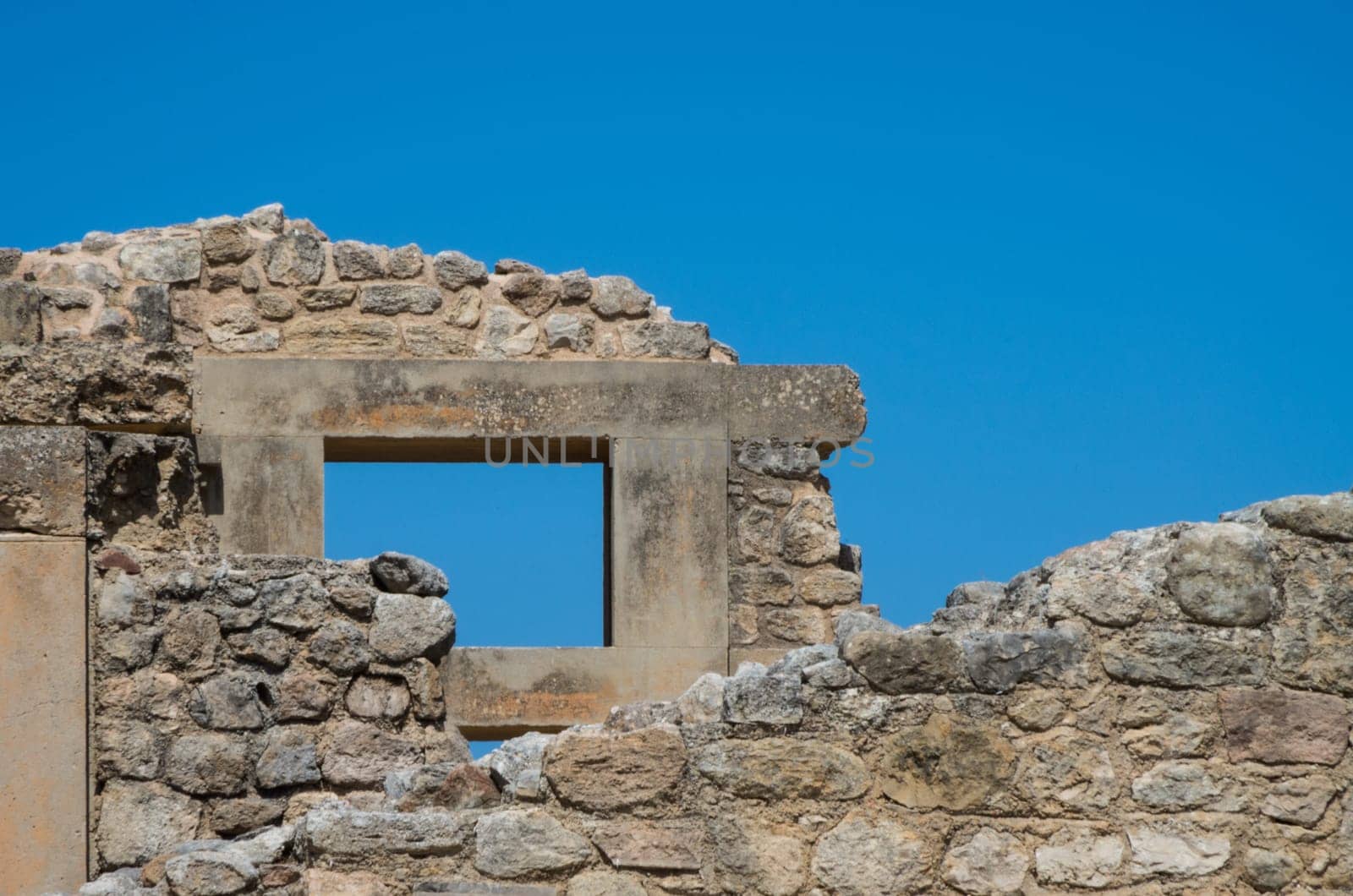 Window on an ancient stone wall