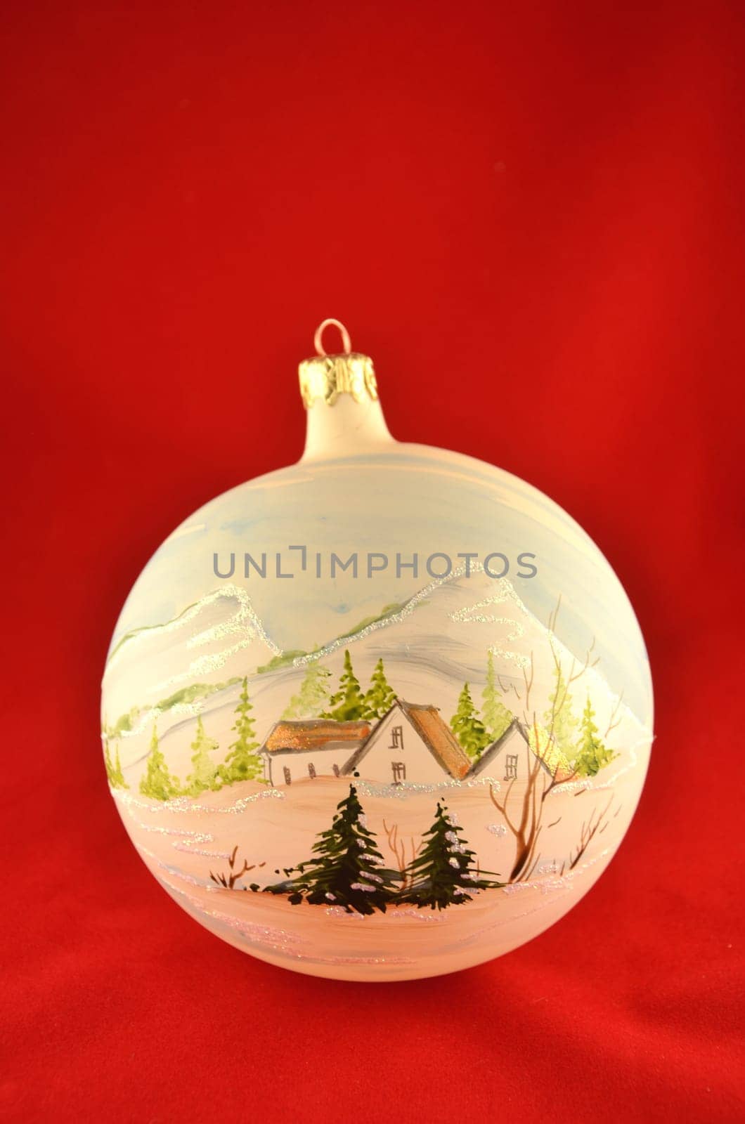 christmas ball isolated on red background