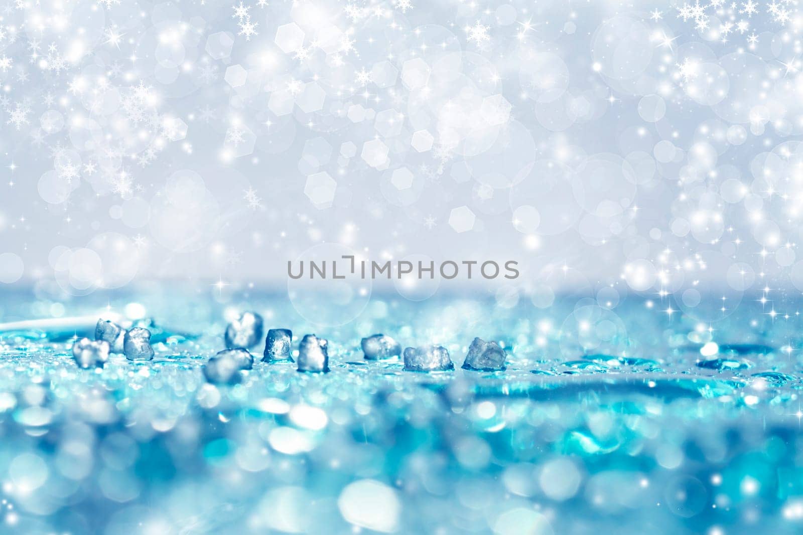 Light silver abstract Christmas background with white snowflakes