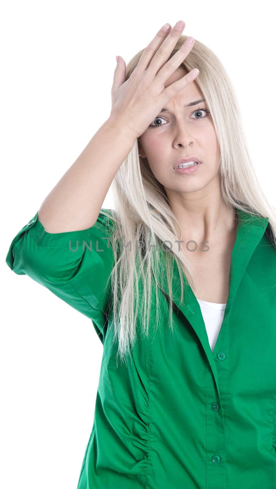 Young blonde shocked woman - forgetfulness - isolated in green blouse