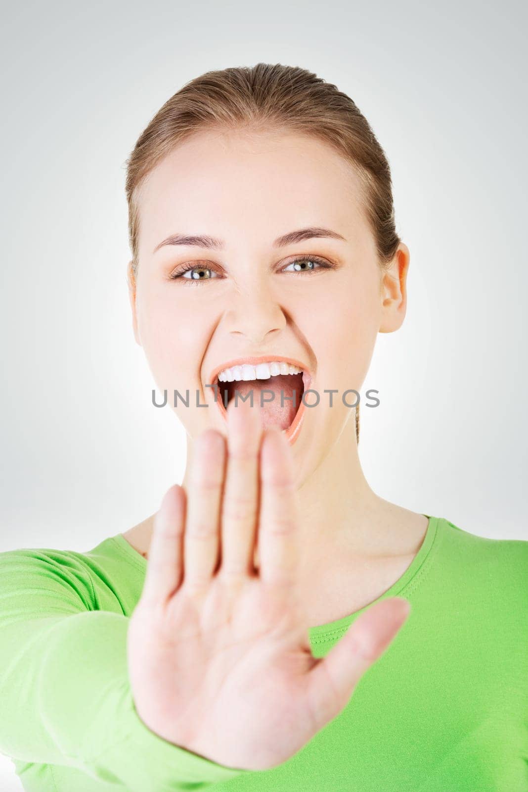 hold on,stop gesture showed by young woman