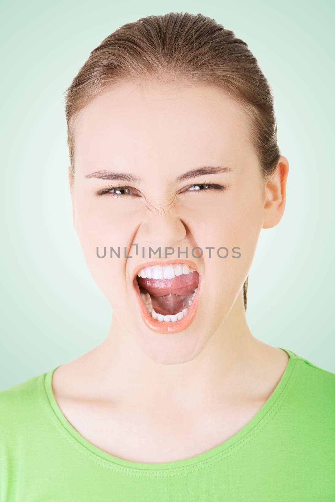 young casual woman screaming with anger