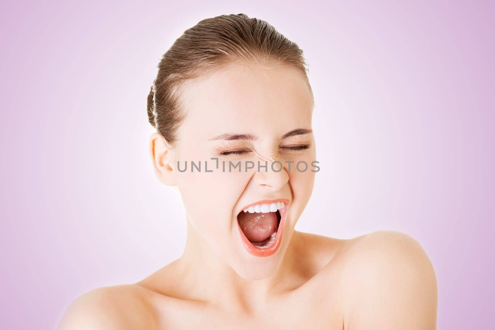 screaming beautiful young woman portrait