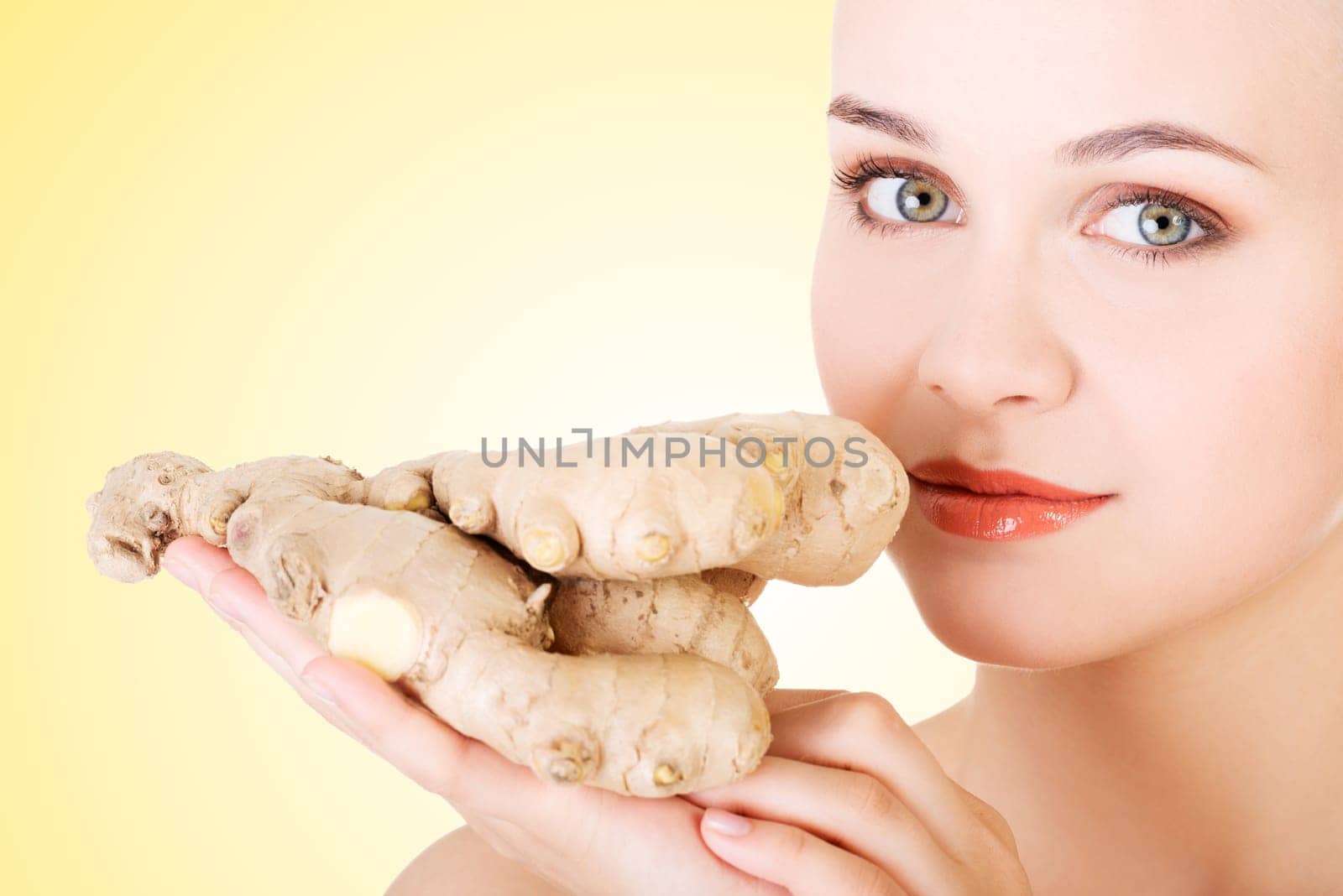 beautiful woman with fresh ginger