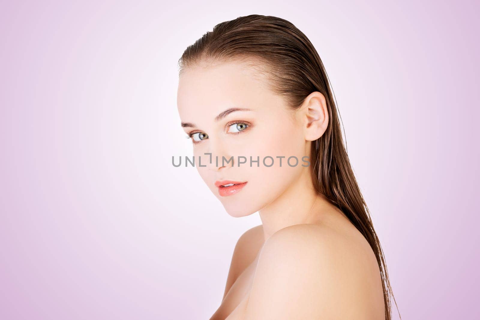 beautiful woman portrait over violet background