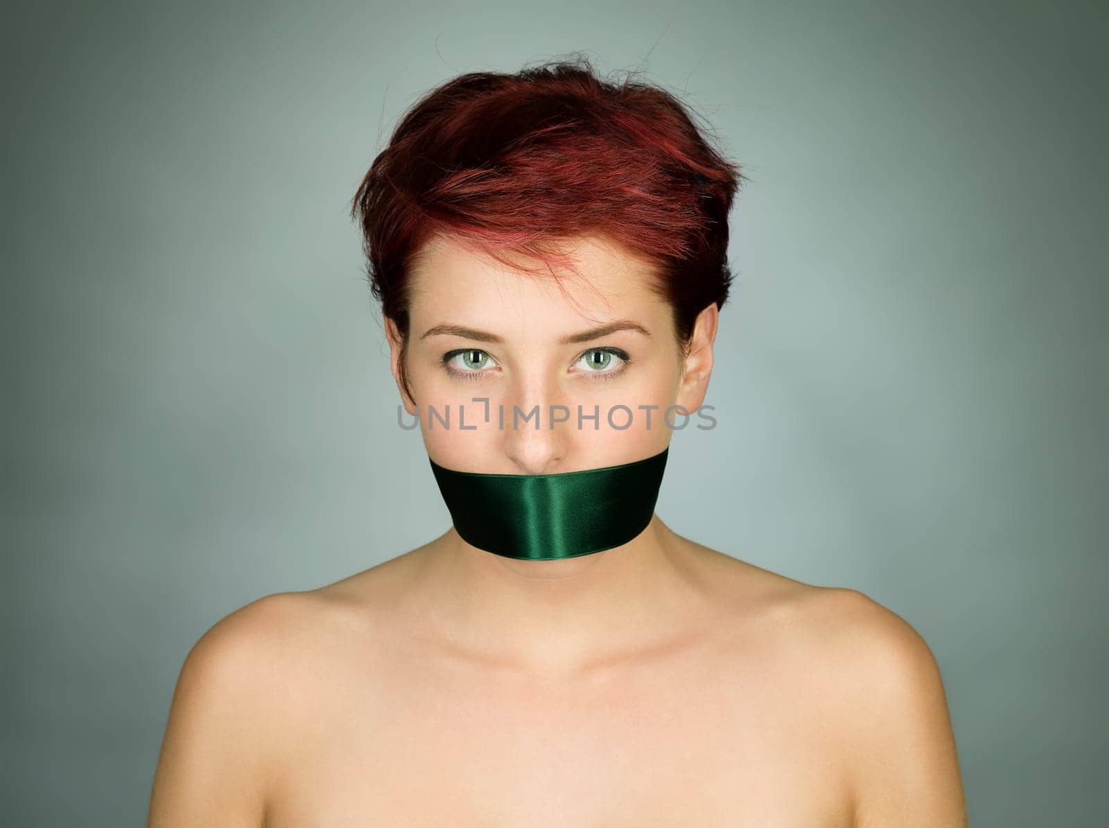 Woman gagged with ribbon