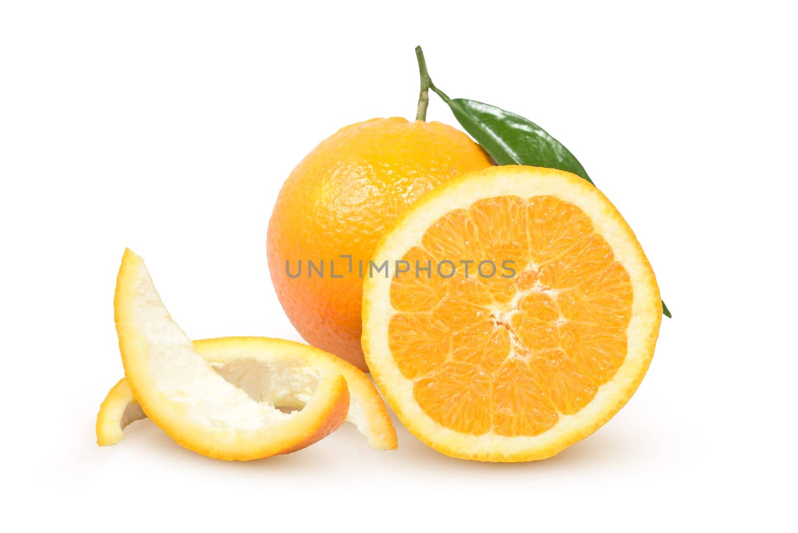 Ripe citrus with a green leaf on a white background