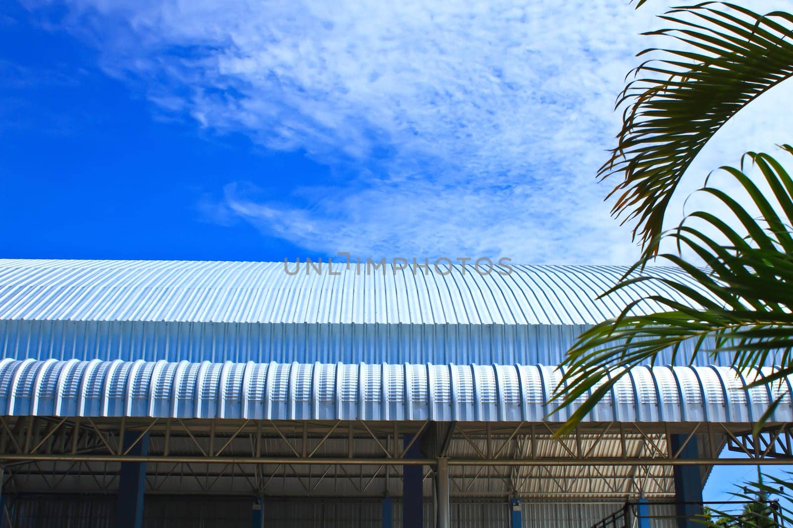 Metalic Facade, roof aluminium factory on blue sky