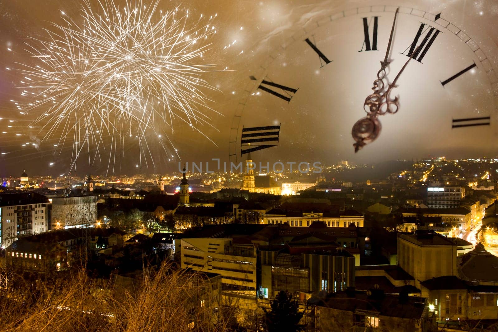 Holiday fireworks and clock close to midnight over the city