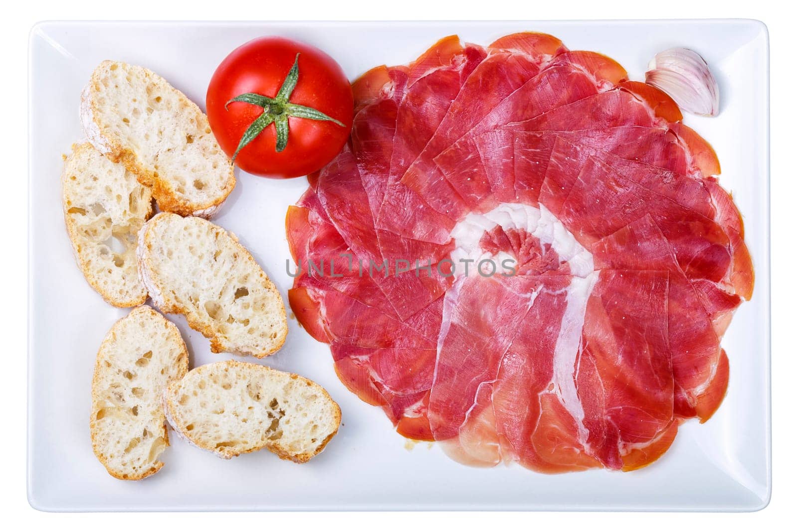 plate of cold cuts ham sausage typical in Spain, isolated on white background