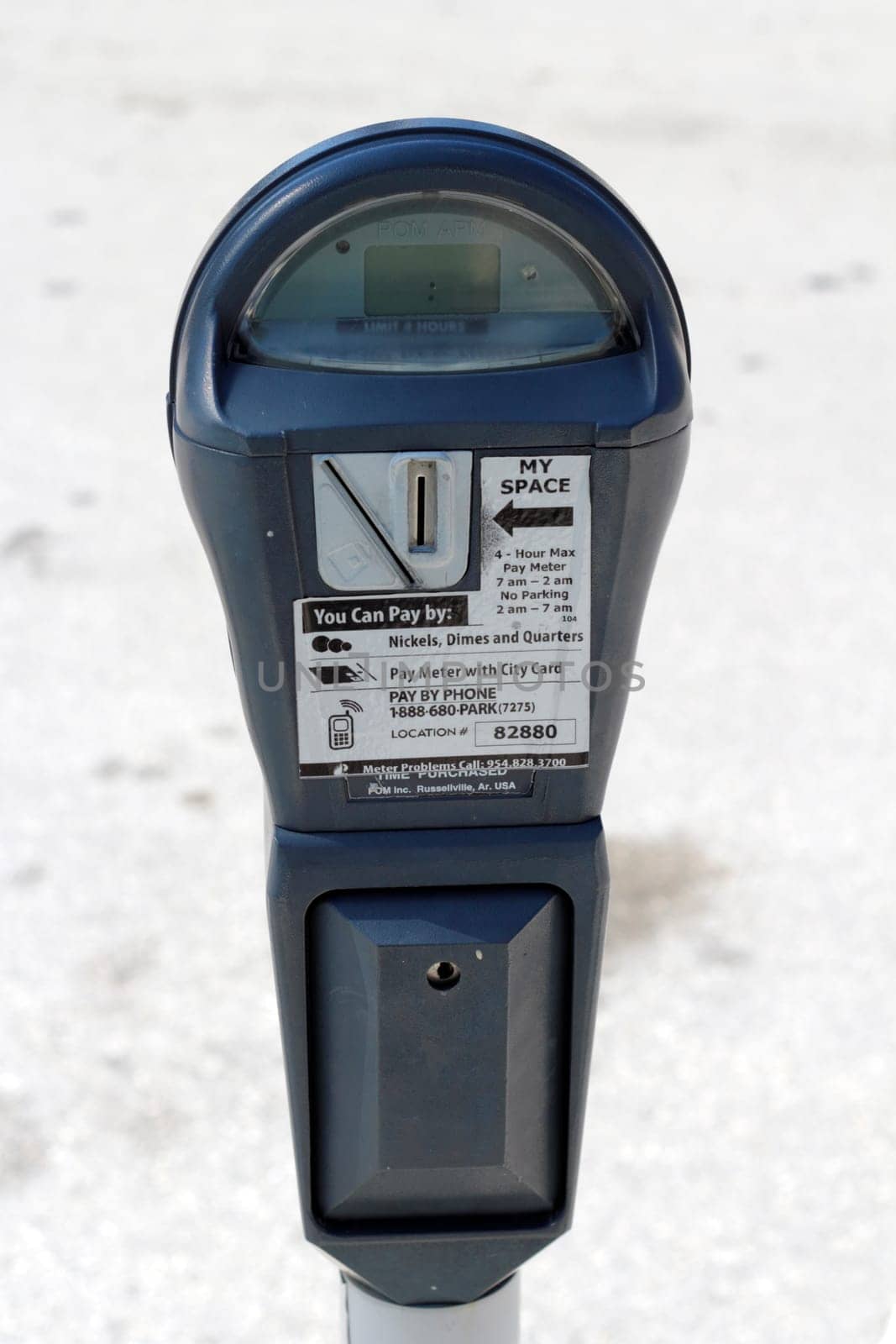 FORT LAUDERDALE, FLORIDA - FEBRUARY 3: One gray metal outdoor urban public parking meter that you pay for parking by coins, city card or pay by phone on February 3, 2013 in Ft Lauderdale, Florida.