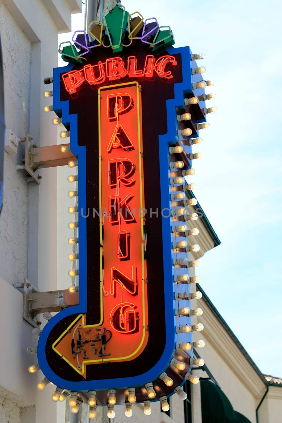 FORT LAUDERDALE, FLORIDA - FEBRUARY 3: Neon public parking sign of a multi-level garage located near River Walk park at Brickell Avenue and SW 1st Ave February 3, 2013 in Ft Lauderdale, Florida.