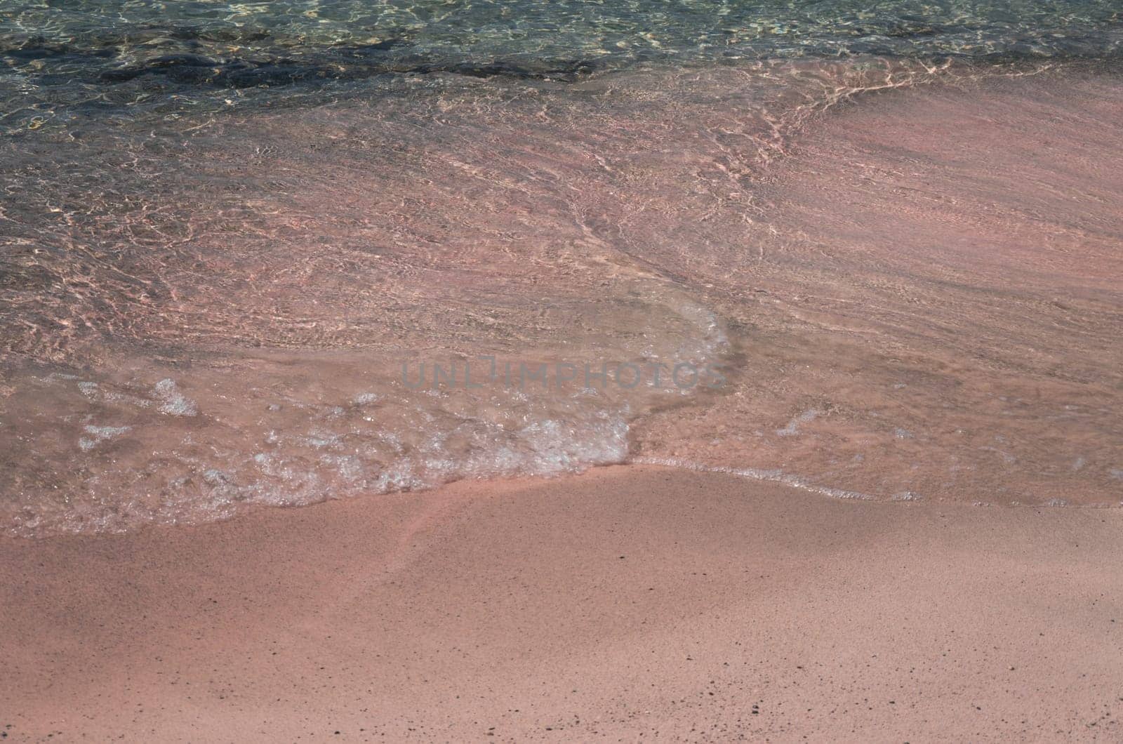 Beaches in Elafonisi, Crete island. have the particularity to be colored pink because of the coral fragments accumulated on the shore