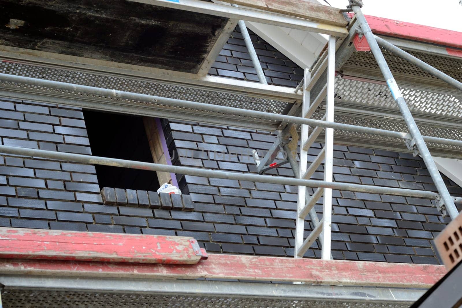 Scaffolding for a new facing masonry