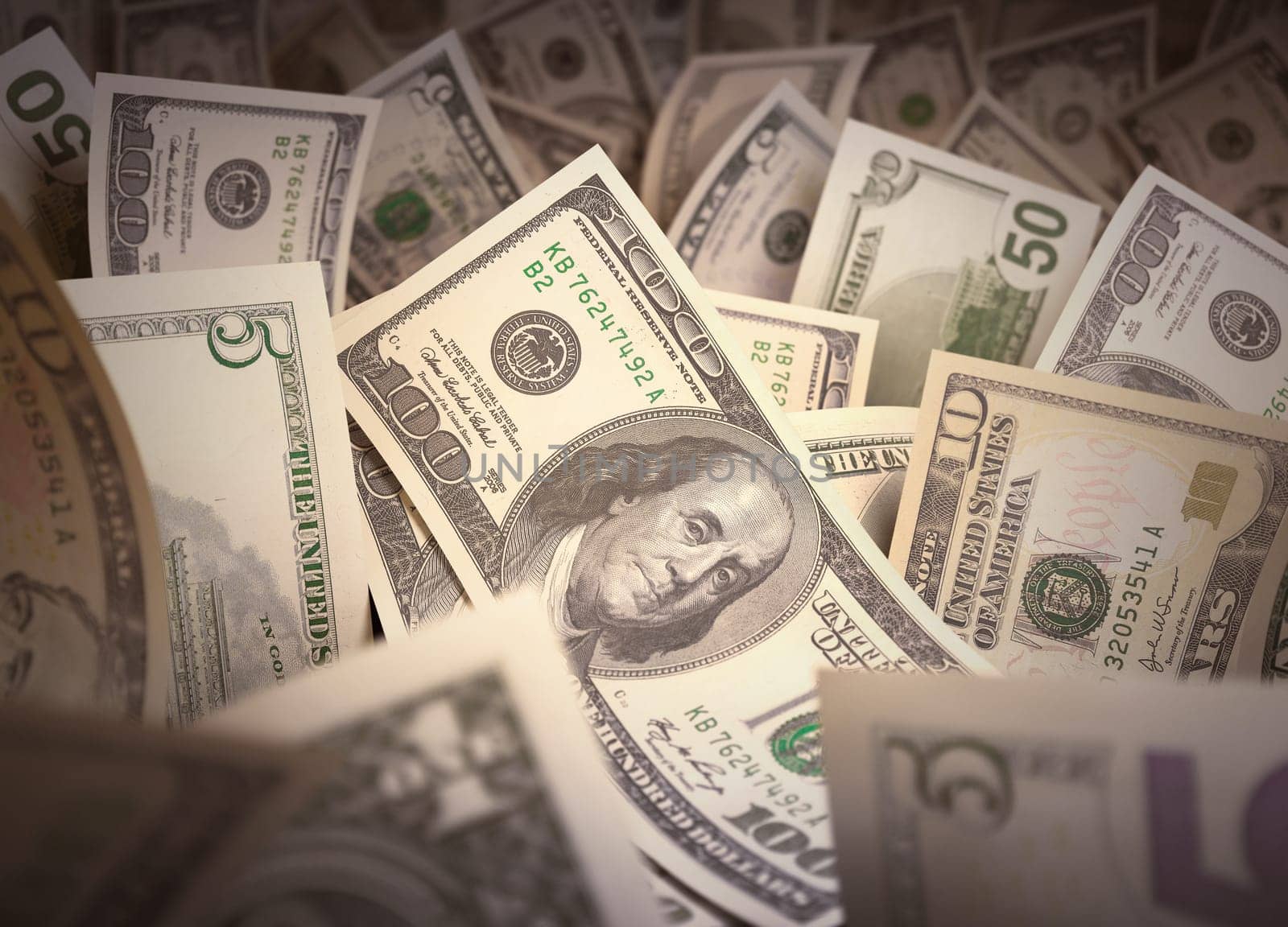 Saving money with the hundred dollar in the center highlighted.