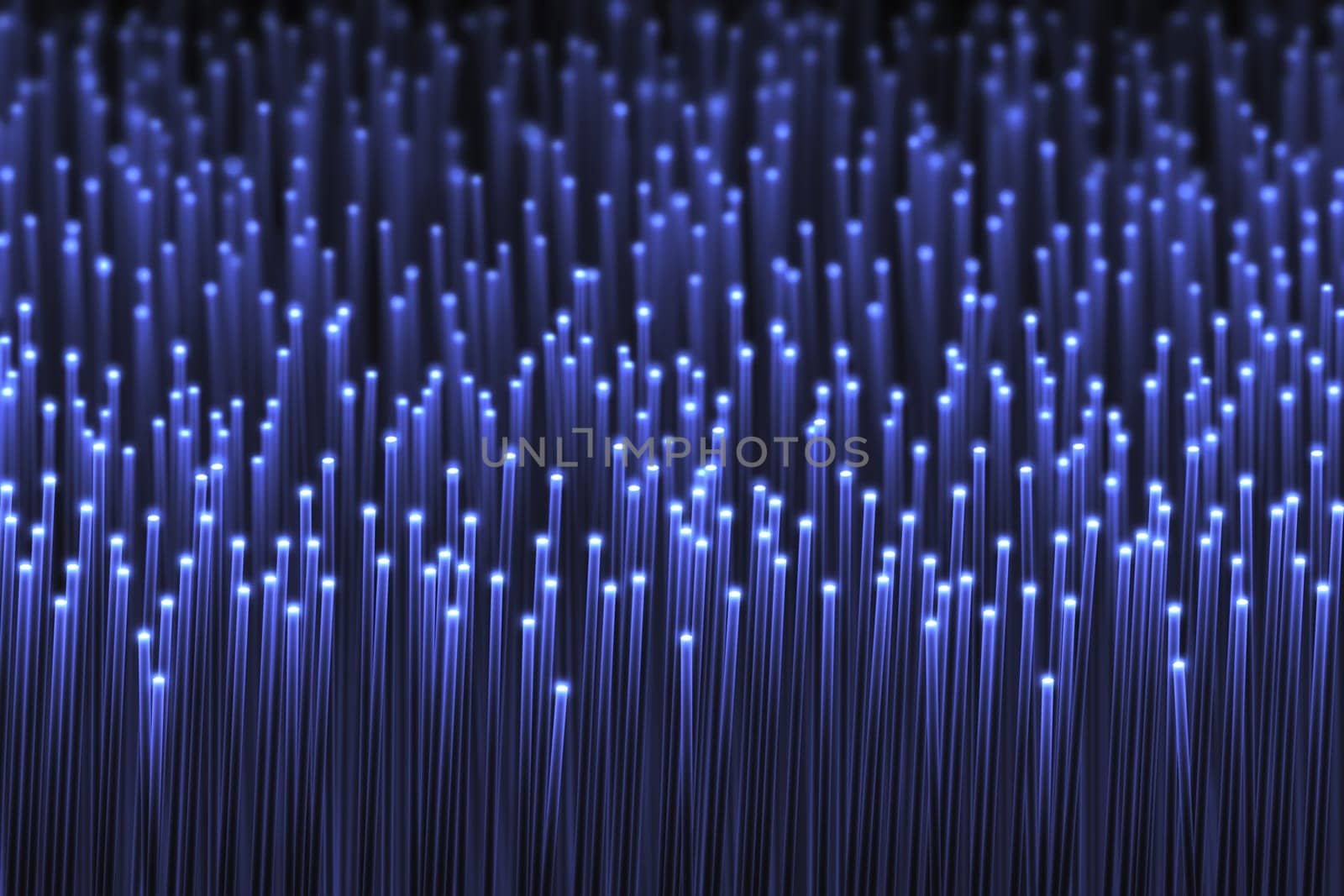 Abstract fiber optic background in a concept of technology of computer processing and the future of communication.