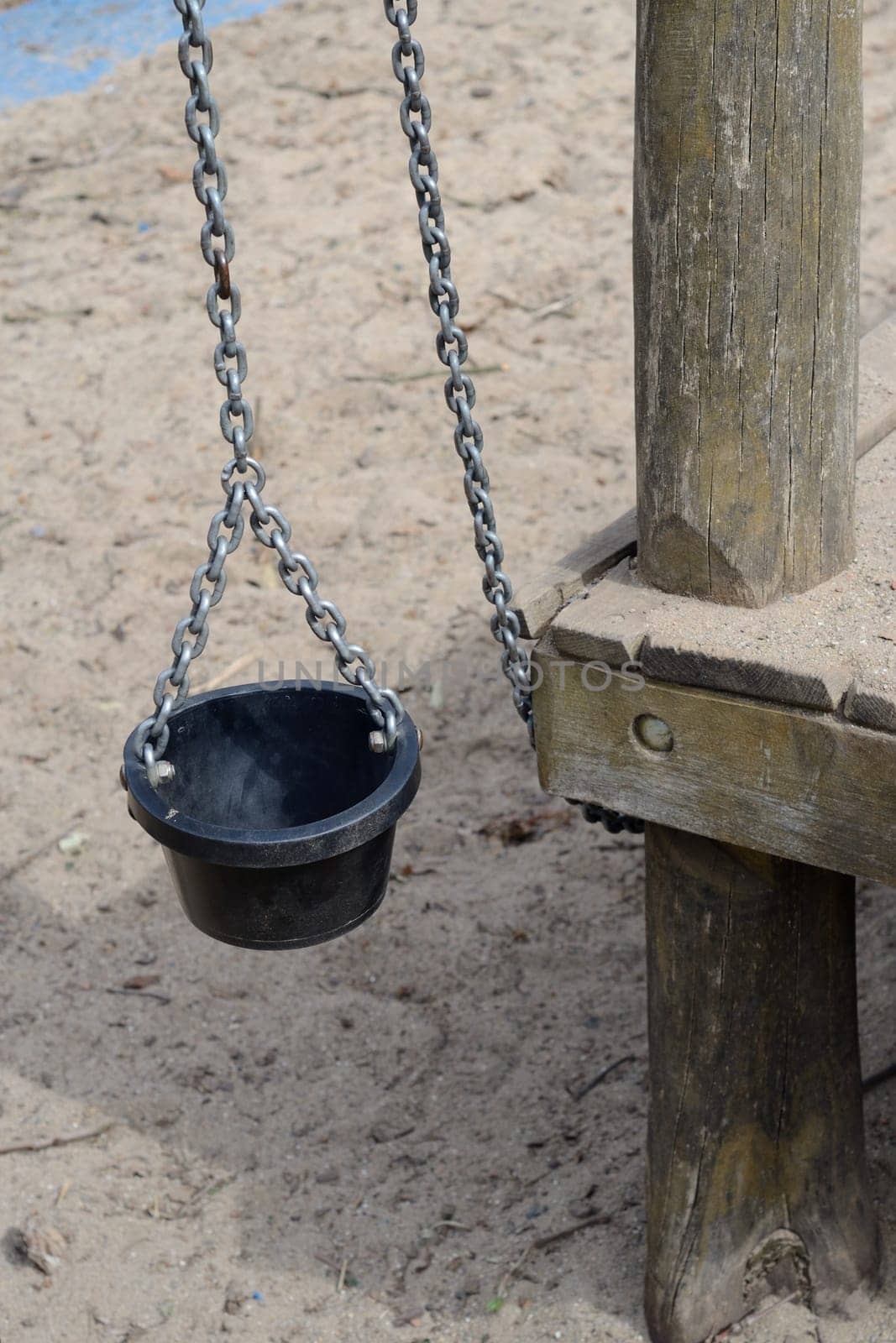 Playground equipment on a sand surface