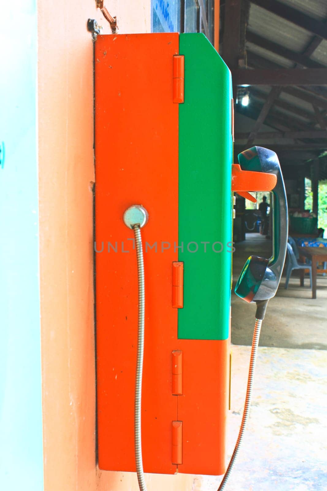 close up public telephone coin in Thailand