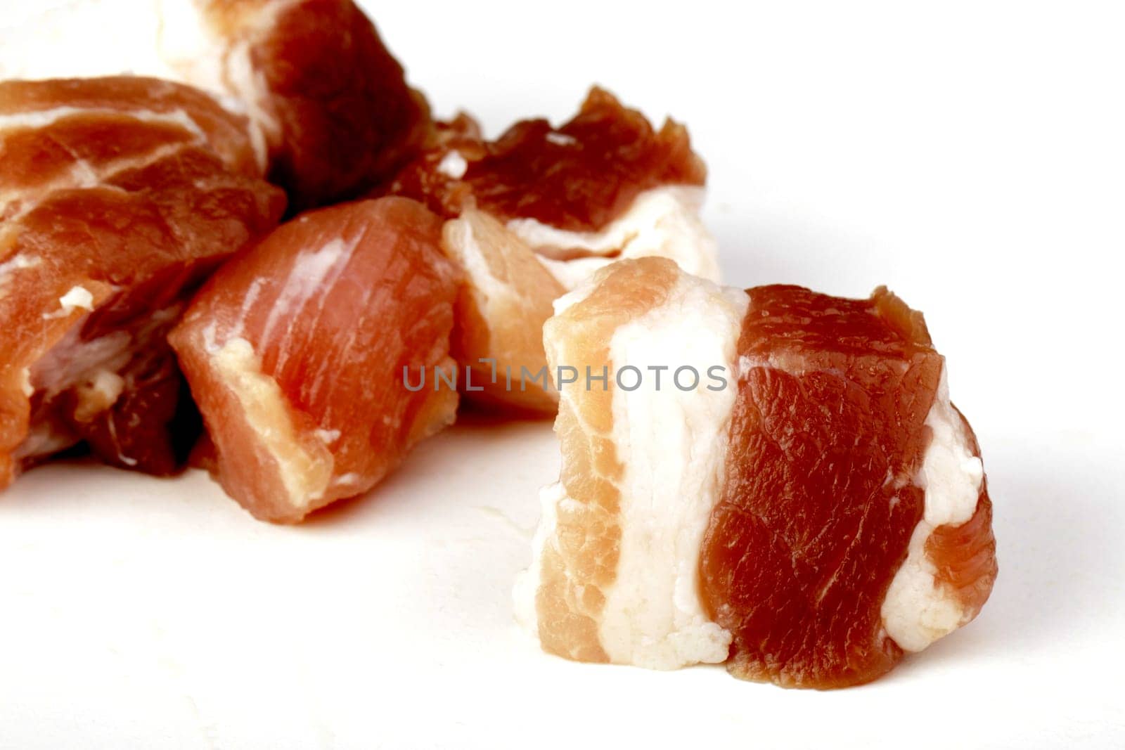 raw bacon in pieces