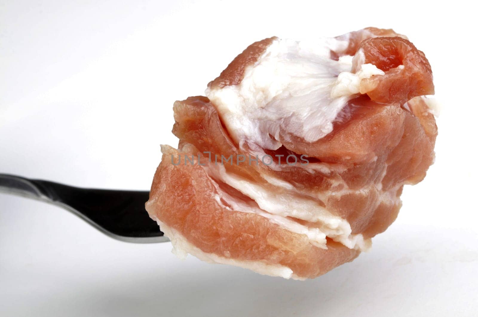 raw bacon in pieces