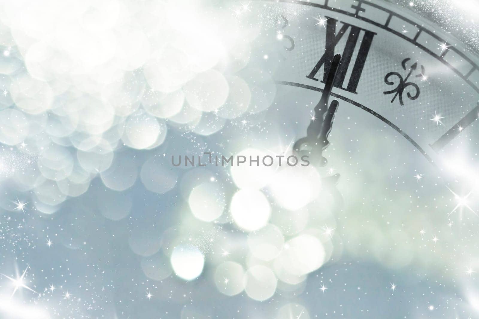 Retro clock New Year's at midnight and holiday lights
