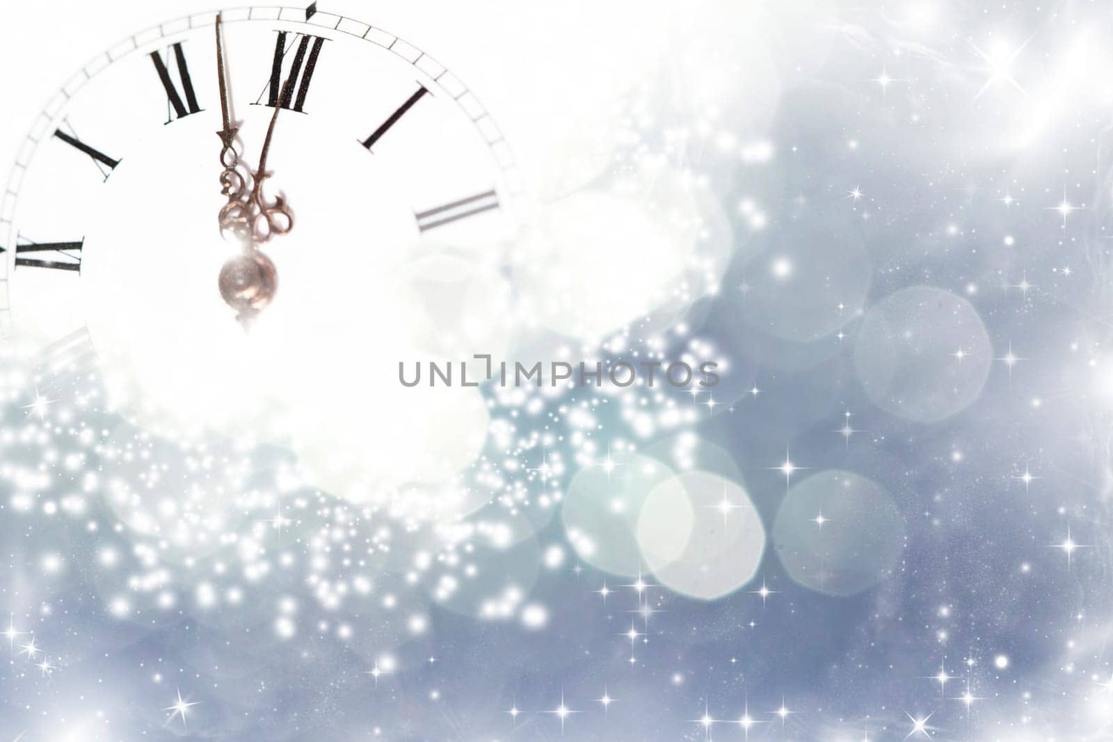 New Year's at midnight - Old clock with stars snowflakes and holiday lights