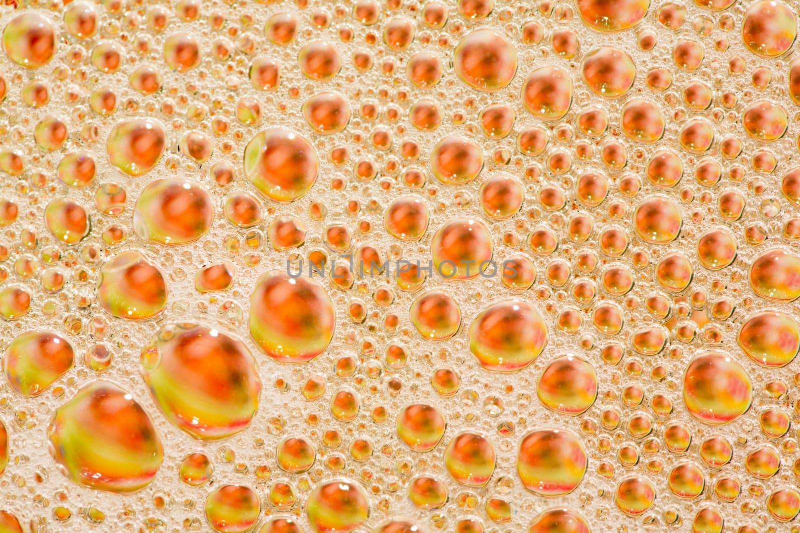 Abstract macro image of soap, oil and water mixture