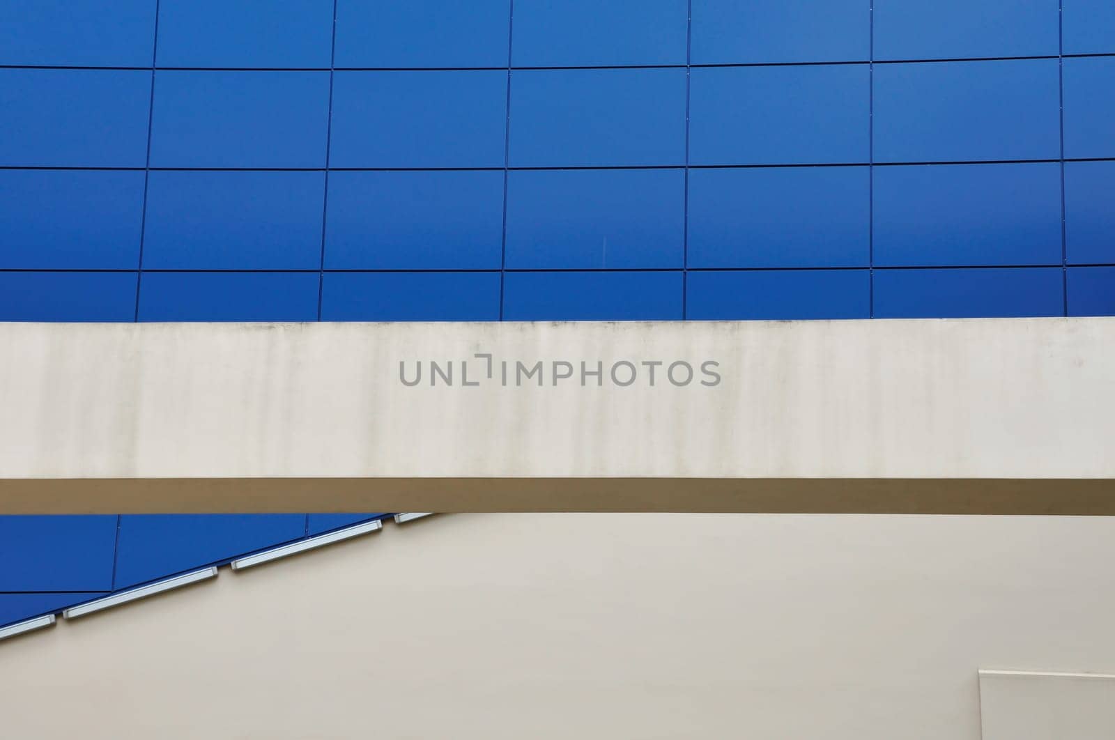 Glass building facade detail abstract architecture background.