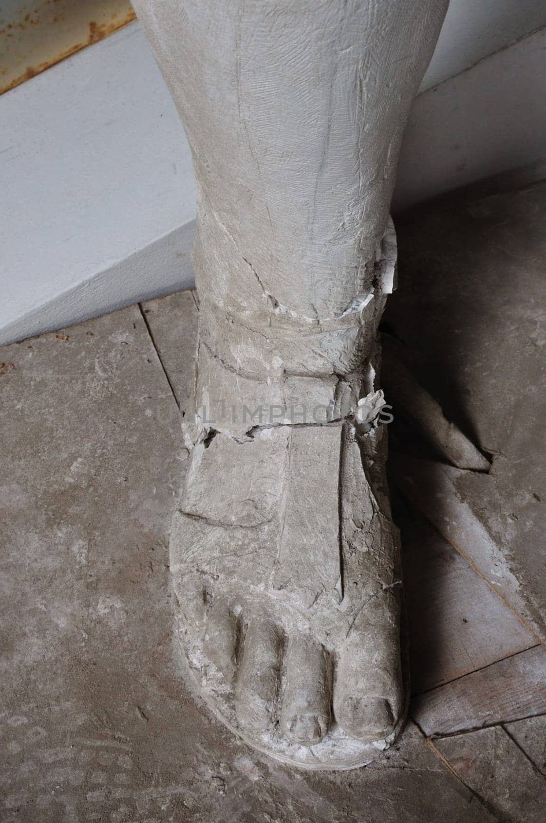 Broken plaster statue foot detail in the abandoned studio of sculptor Nikolaos Pavlopoulos, Athens Greece, February 3, 2012.