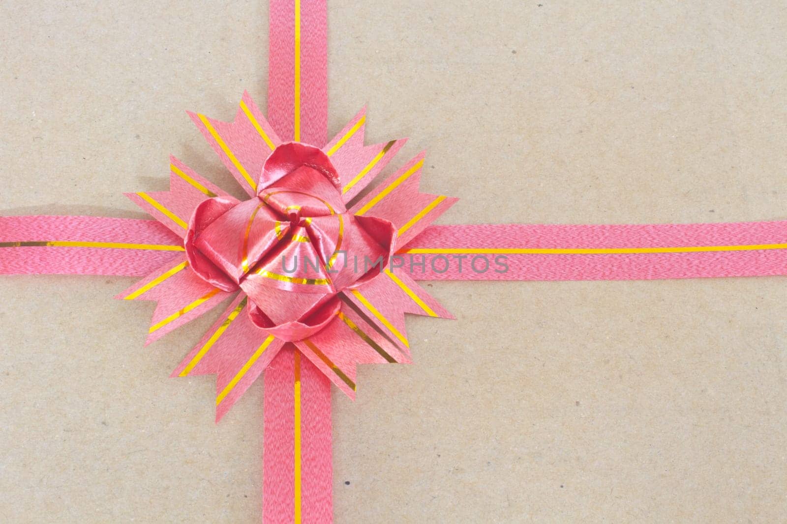 ribbon and bow on brown gift box