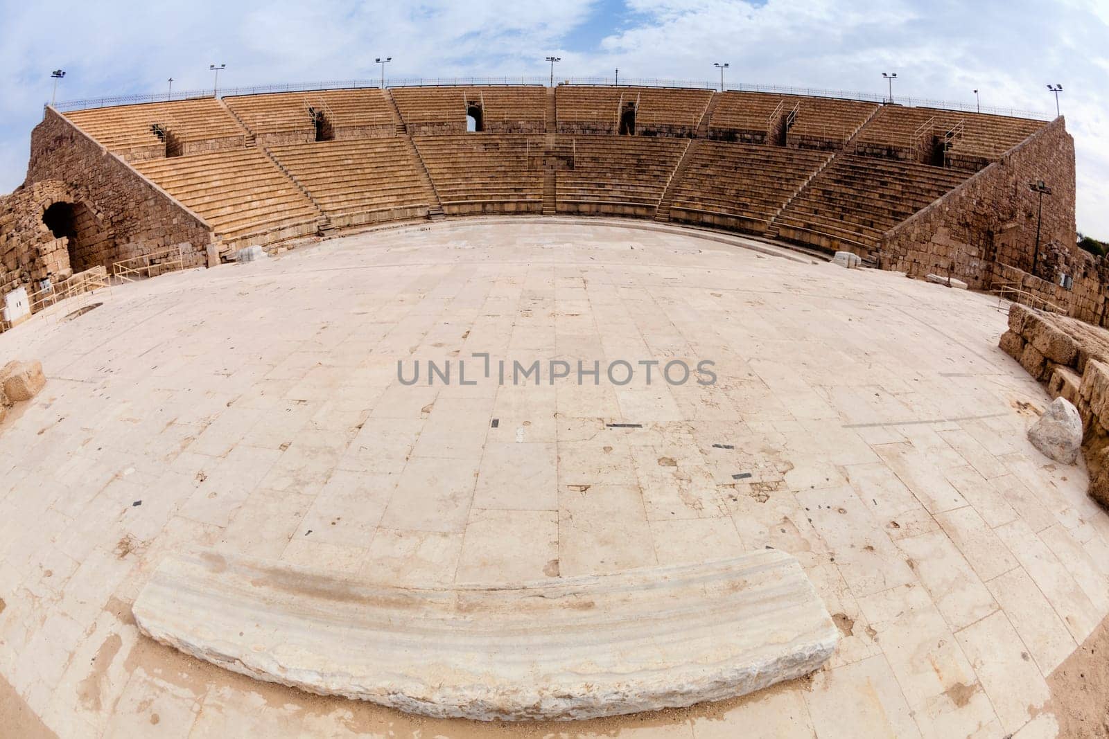 Fisheye view of an ancient Roman amphitheater in Caesarea in Israel