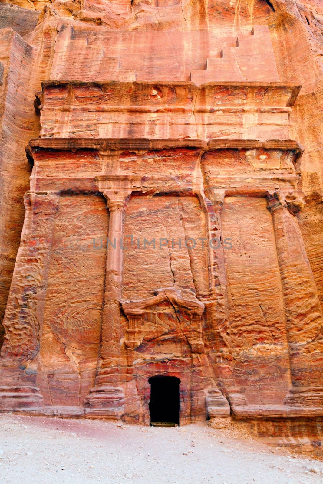Ancient tombs carved in the rock in Petra, Jordan