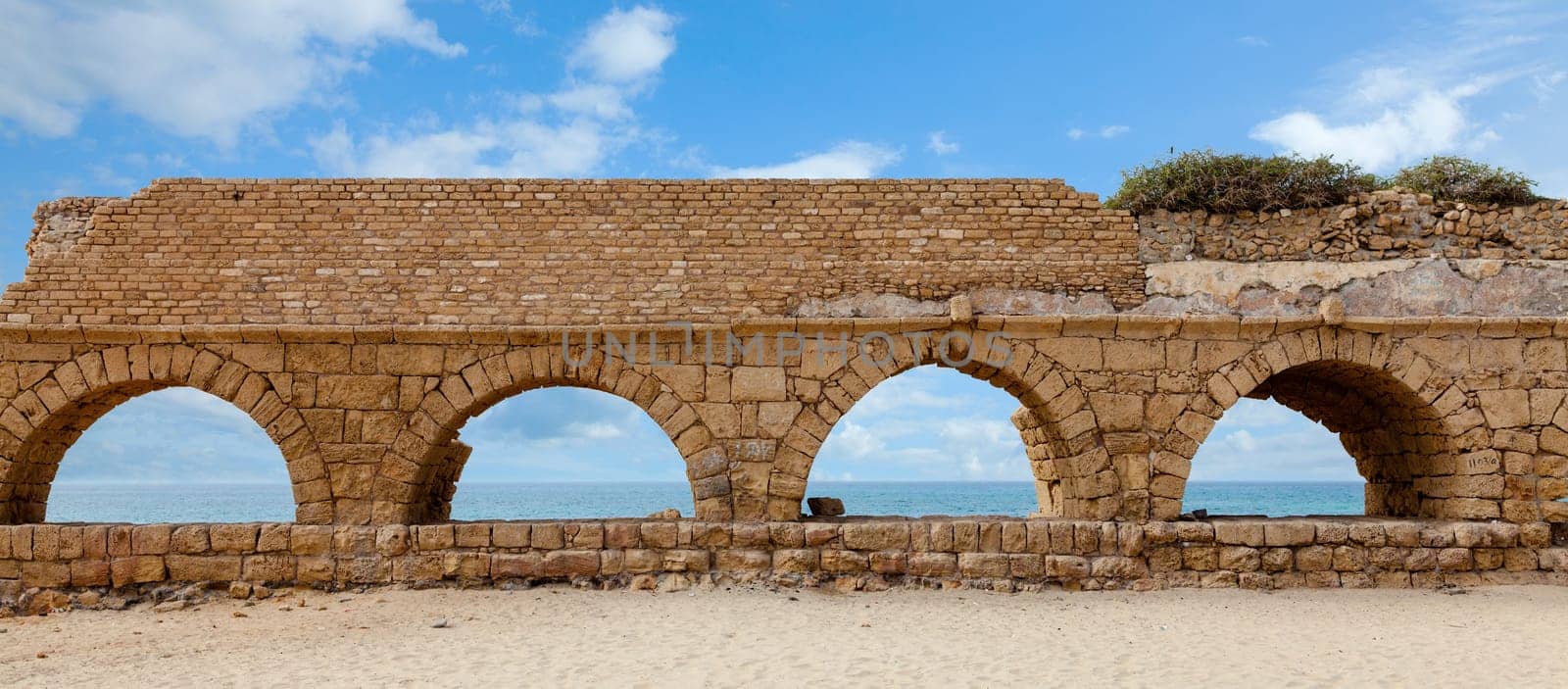 Ruins of a Roman aqueduct in Caesarea, Israel