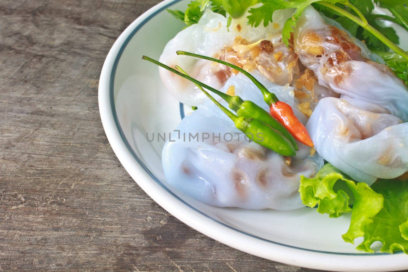 steamed rice skin dumplings, Thai style dessert on wooden