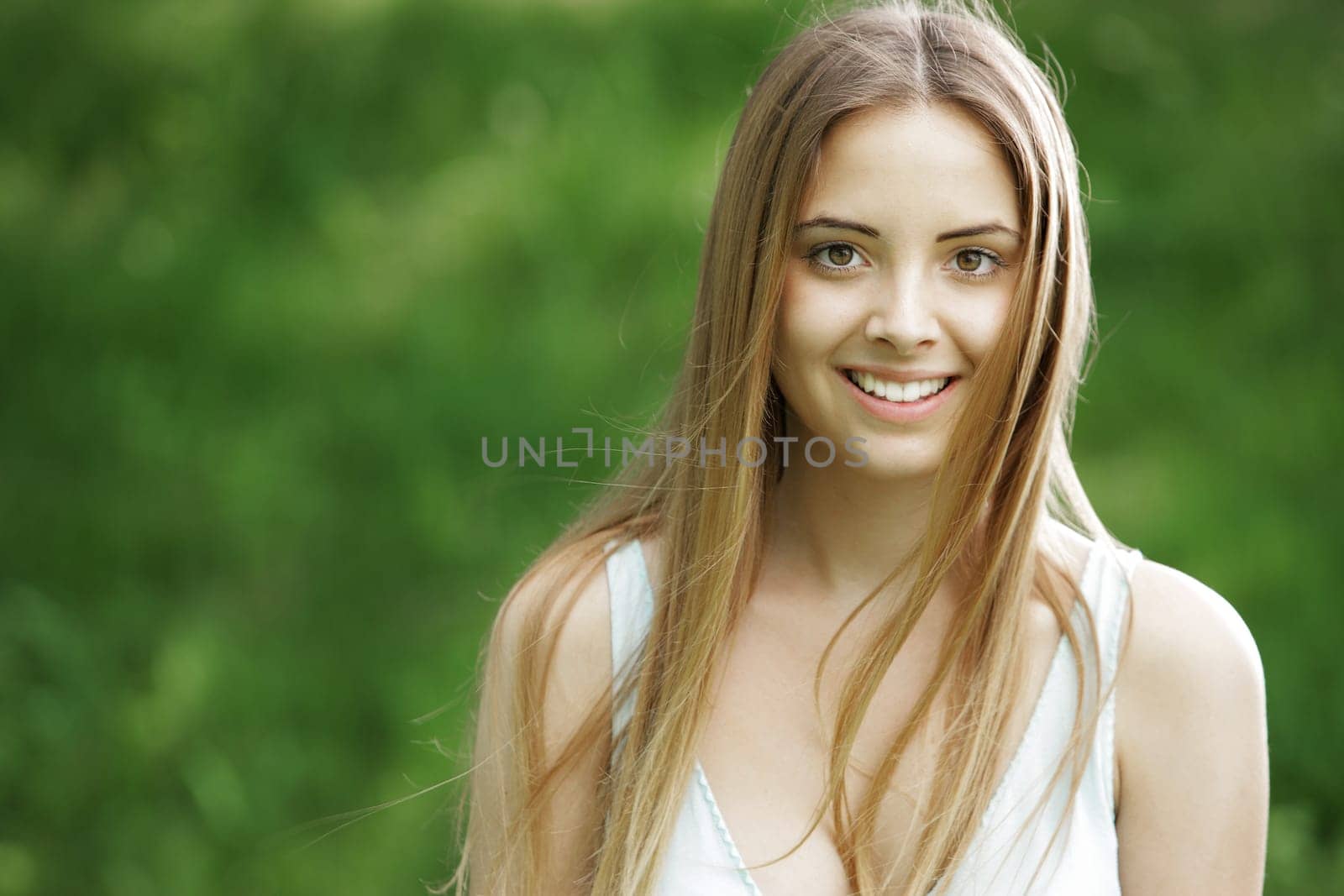 Beautiful Smiling Woman Outdoors