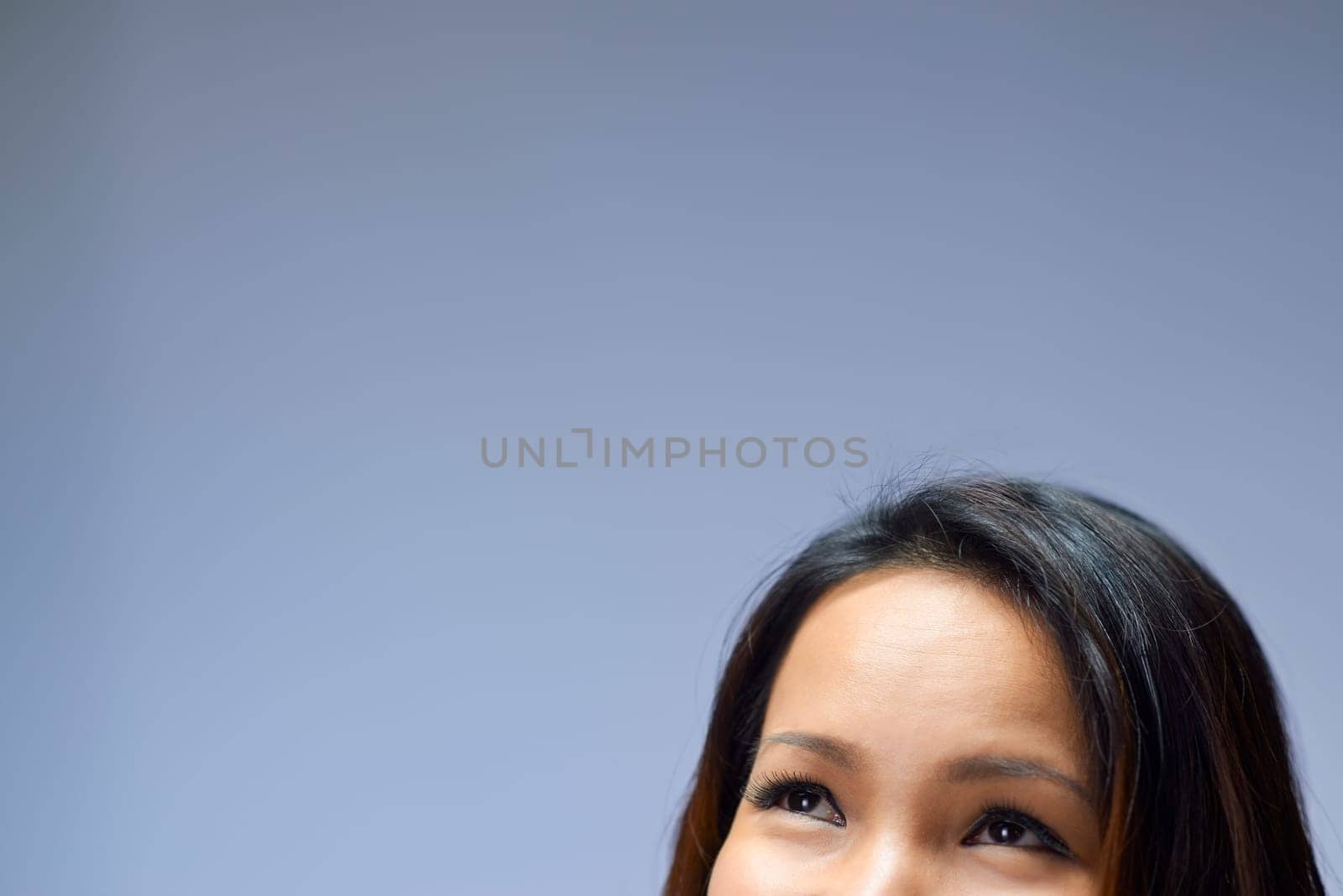 Young people and body care with portrait of happy asian girl smiling in studio on gray background, cropped face and copy space
