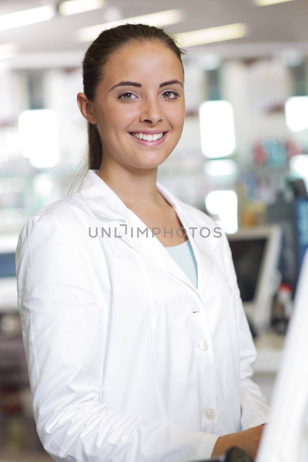 Environmental Portrait of a medical personnel, or doctor in pharmacy