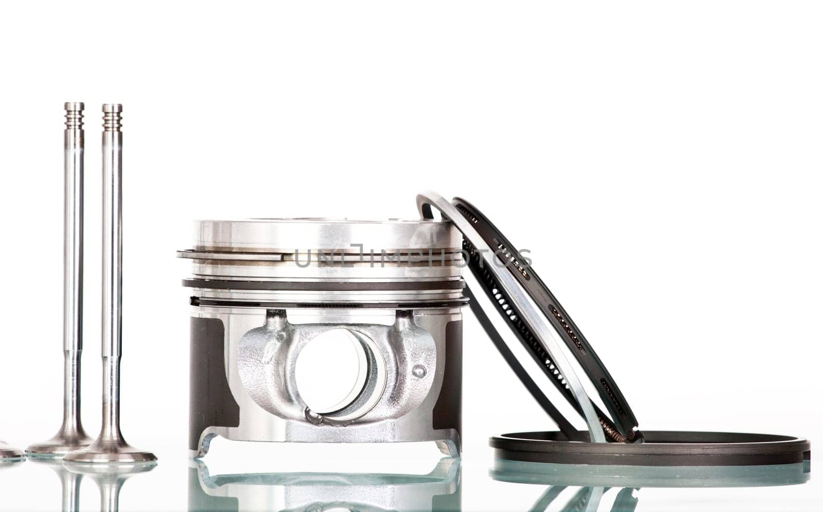 Piston and accesories  isolated on white