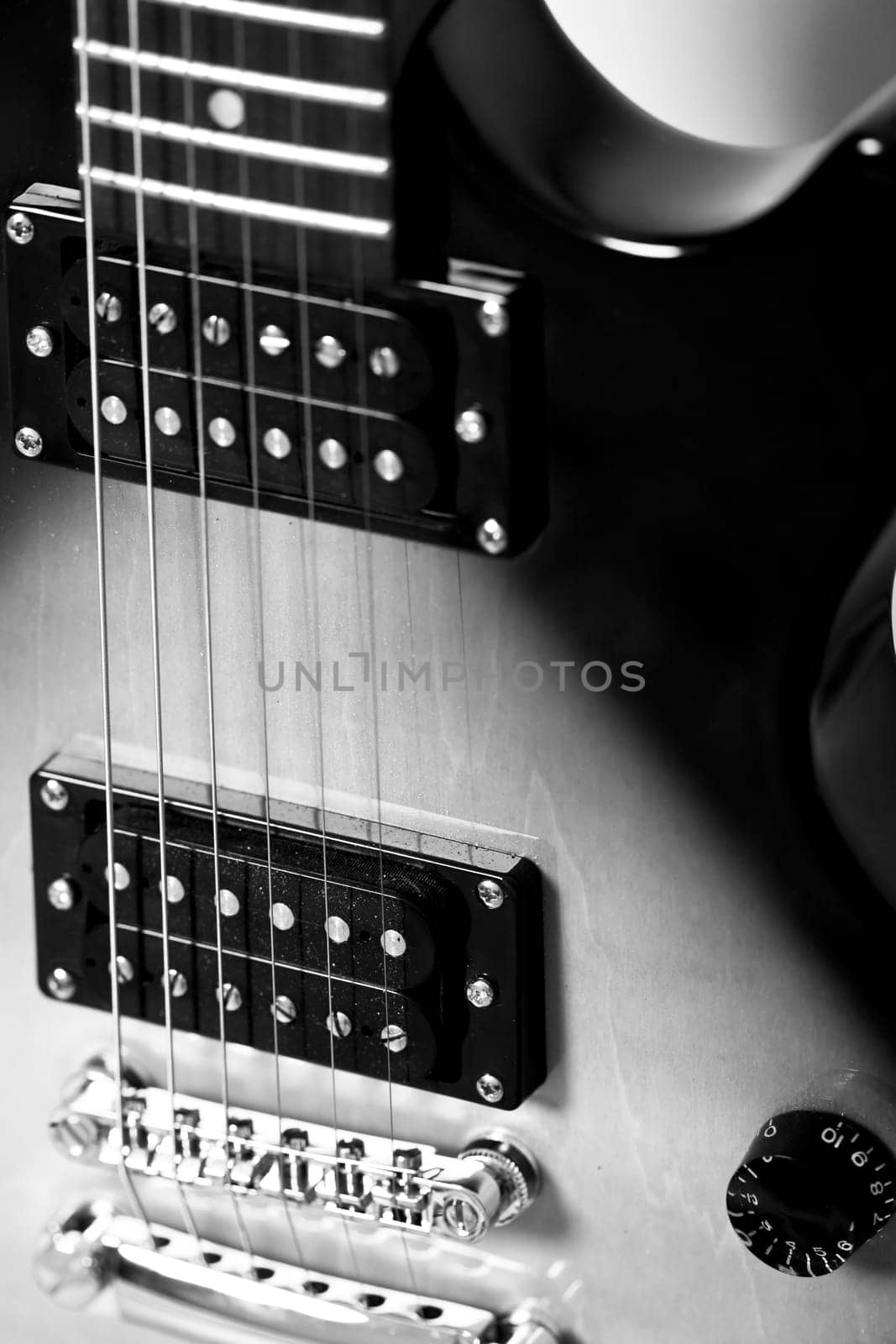 Black and white photo of electric guitar