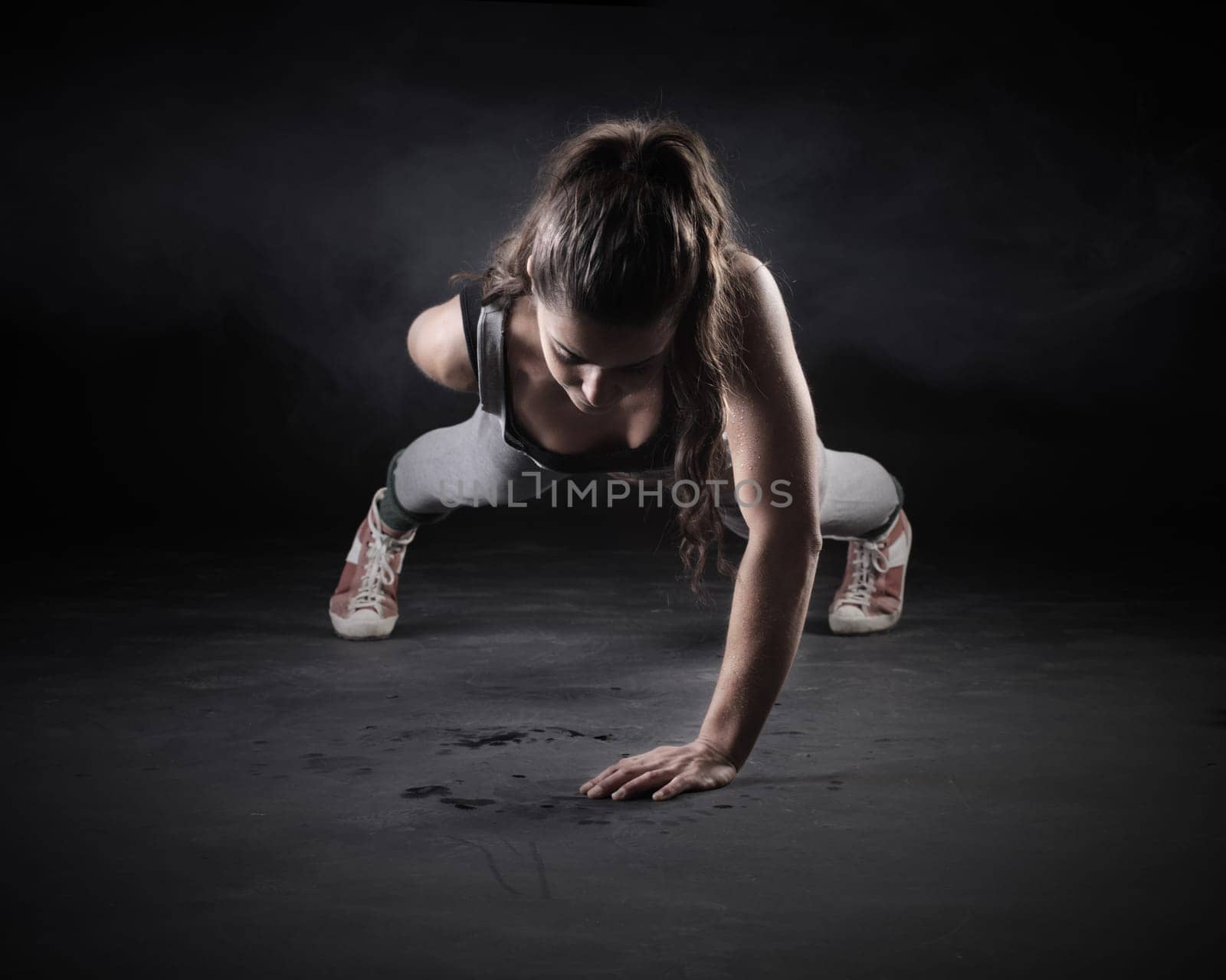 Young Woman Doing Push-Ups