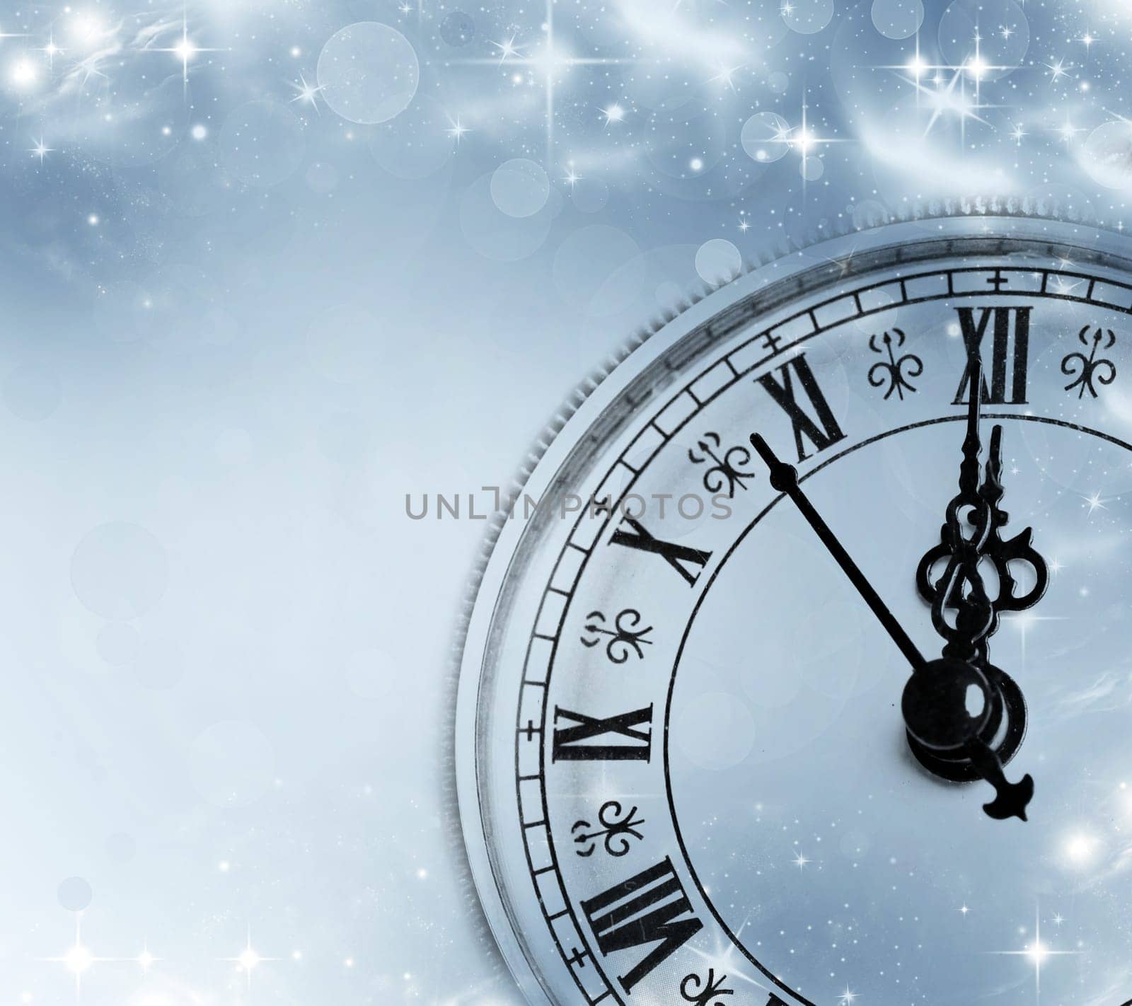 Old clock against holiday lights