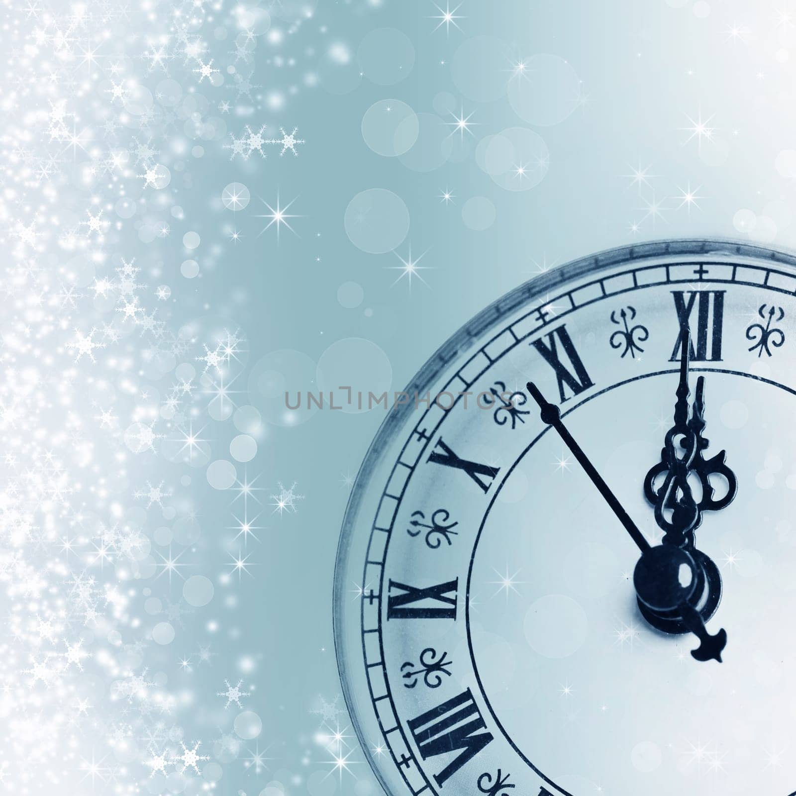 Old clock against holiday lights