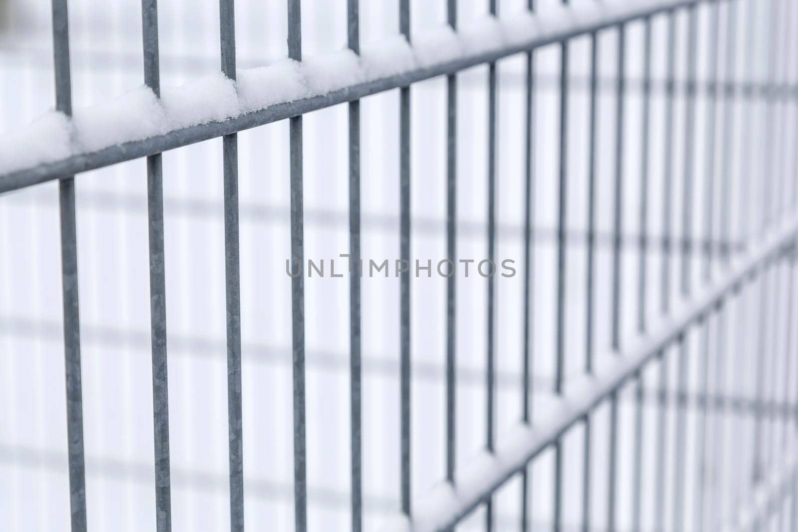 Iron grid background in winter
