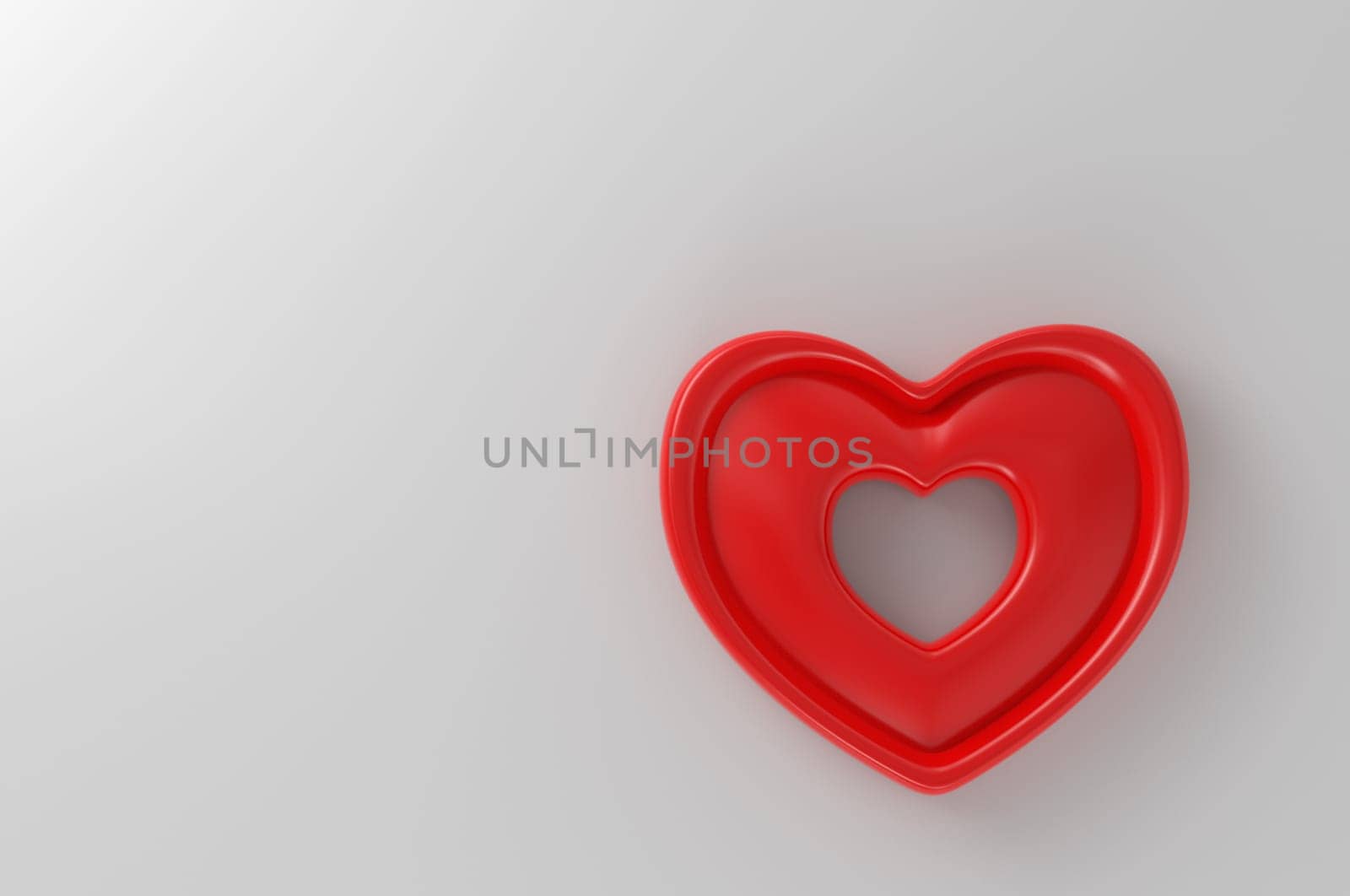 Plastic heart on white background